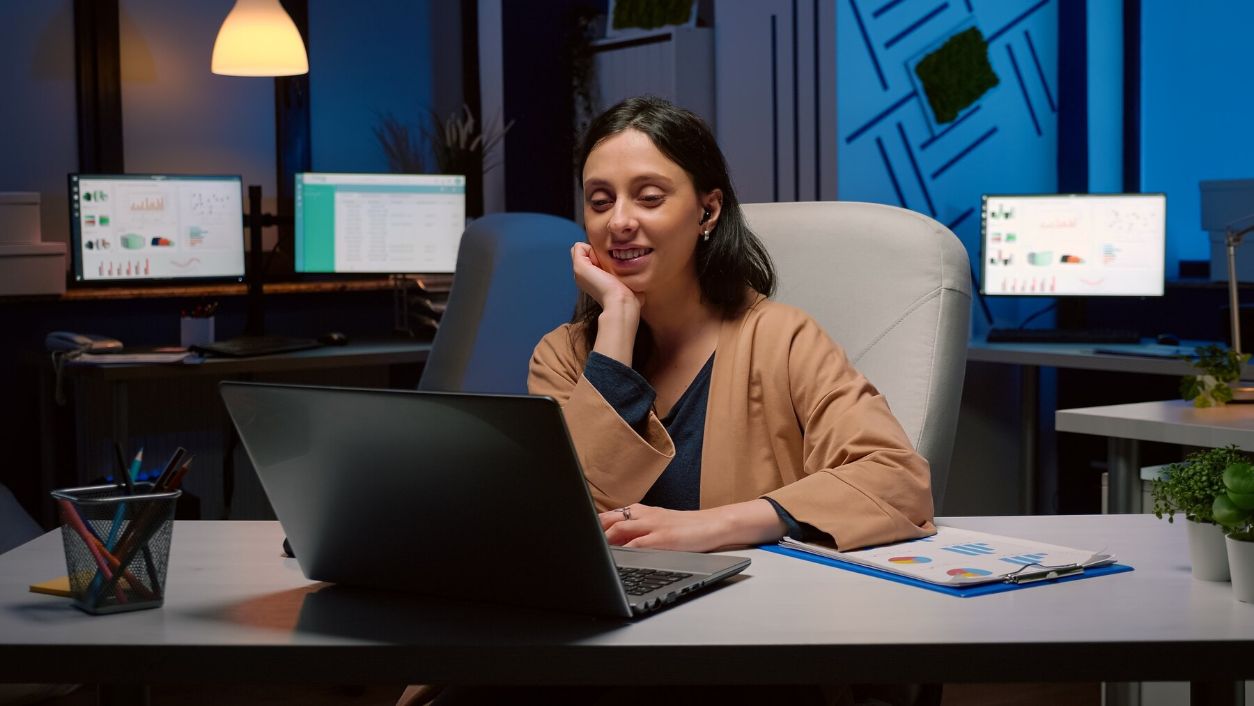 Person working on laptop in comfortable environment